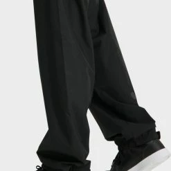 AGU GO Regenbroek Essential Unisex - Zwart - M - Dames & Heren - Waterdicht & Ademend -Windgoo Shop 550x754 1